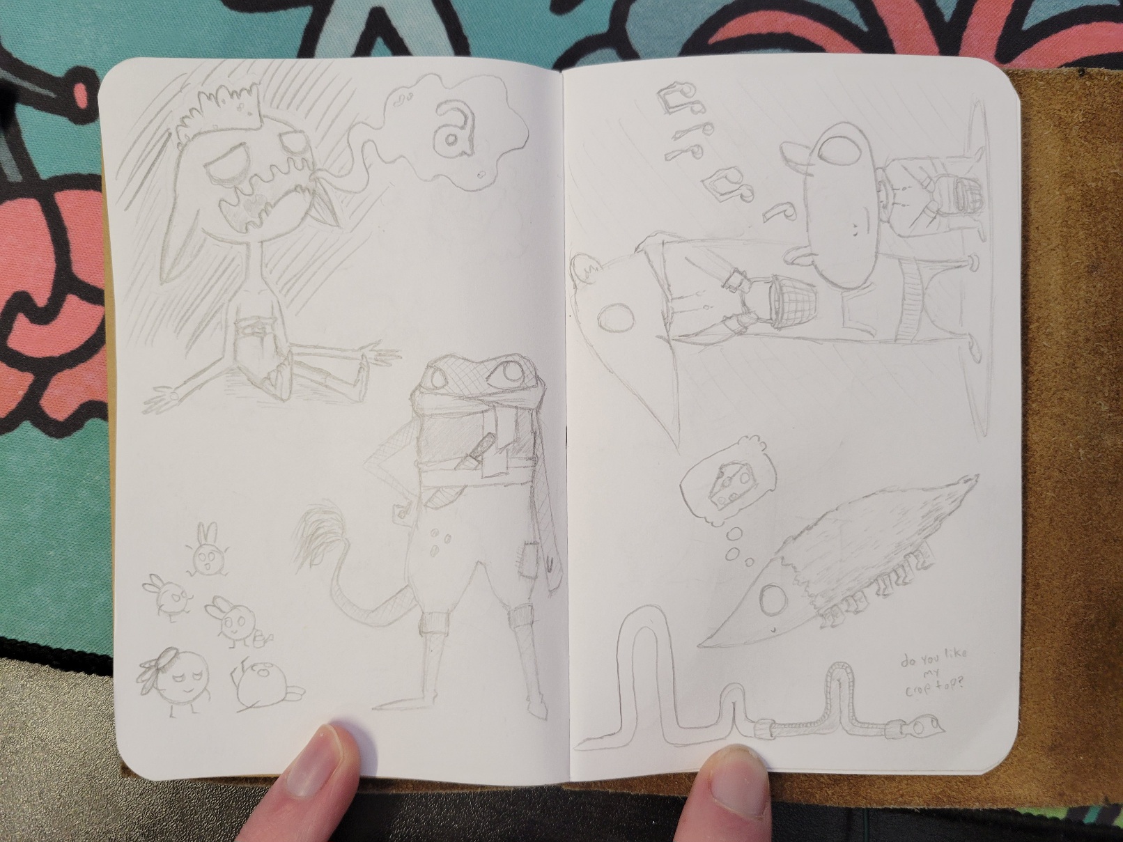 A full page spread of goblins. There is a mole-like goblin with many legs thinking of cheese, a froglike goblin with a scarf and lion's tail, a collection of tadpole people goblins, the goblin sitting on the floor saying 'a', a mouse goblin towering next to a squat goblin and a worm goblin asking, 'do you like my crop top'