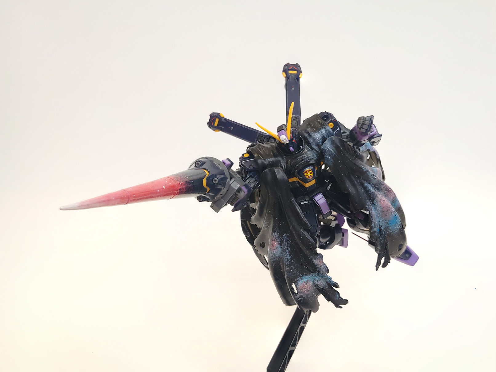 The robot, dashing forward with its lance, cloak swooshing. The whole picture from lance tip to toes is in focus