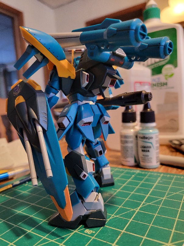 A rear-facing photo of the HG Calamity Gundam Model. The colormatching is especially apparent in all of the grey rocket boosters