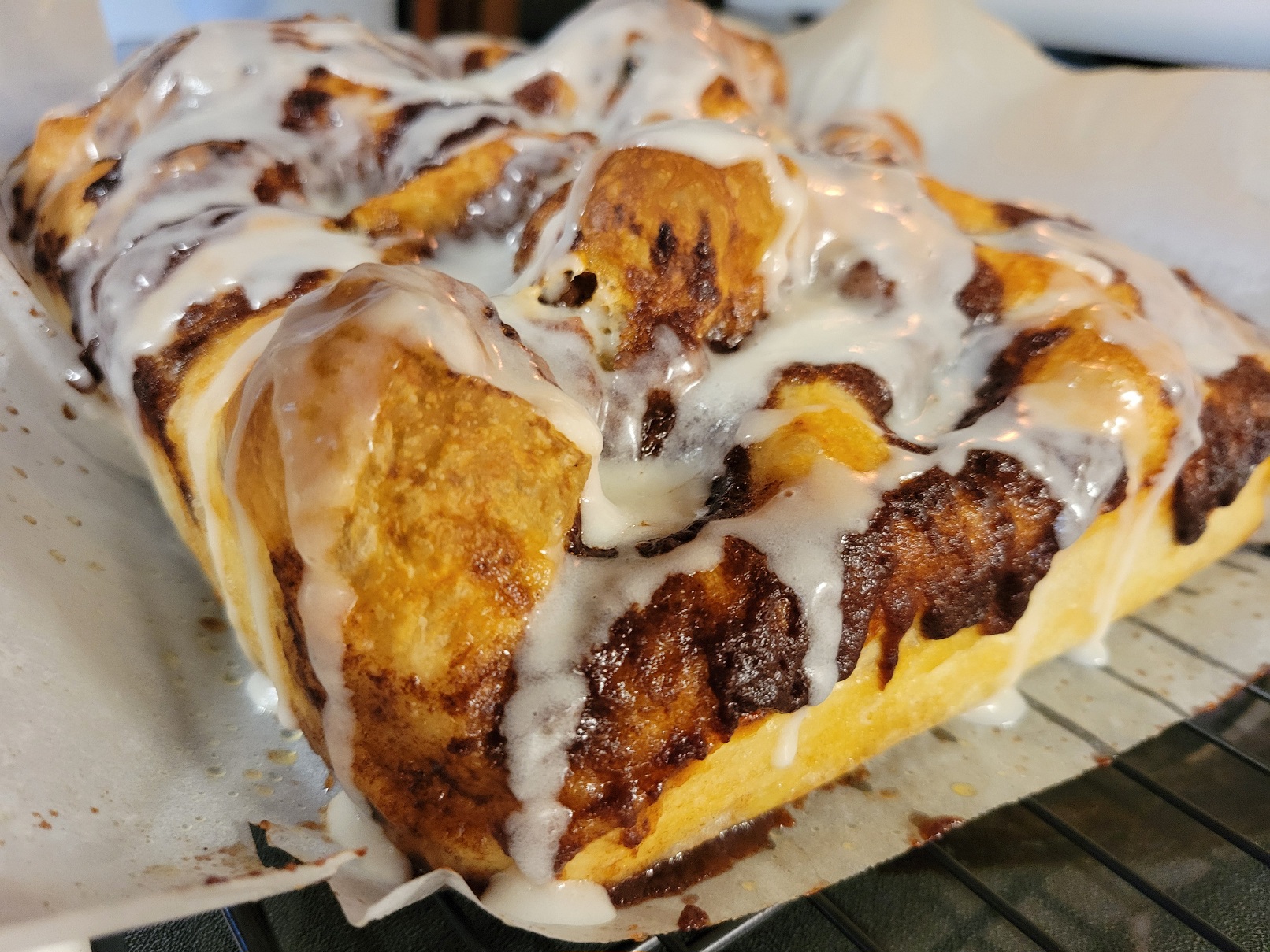 An alternate angle on the focaccia, showing off its giant bubbly peaks and valleys